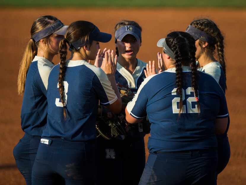 Keller players rally at the mound during the first inning of a UIL Class 6A state semifinal...