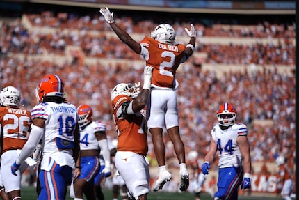 Texas wide receiver Matthew Golden (2) celebrates his touchdown against Florida during the...