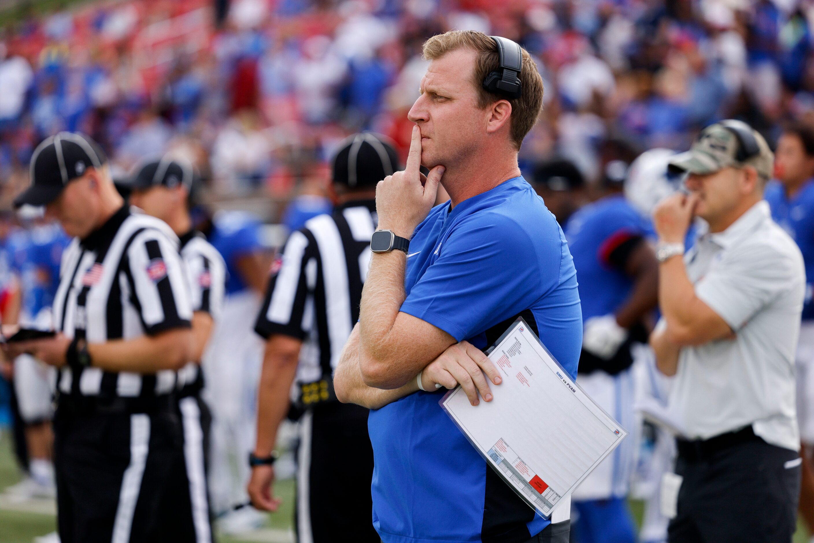 SMU head coach Rhett Lashlee walks the sideline before the first half of an NCAA football...