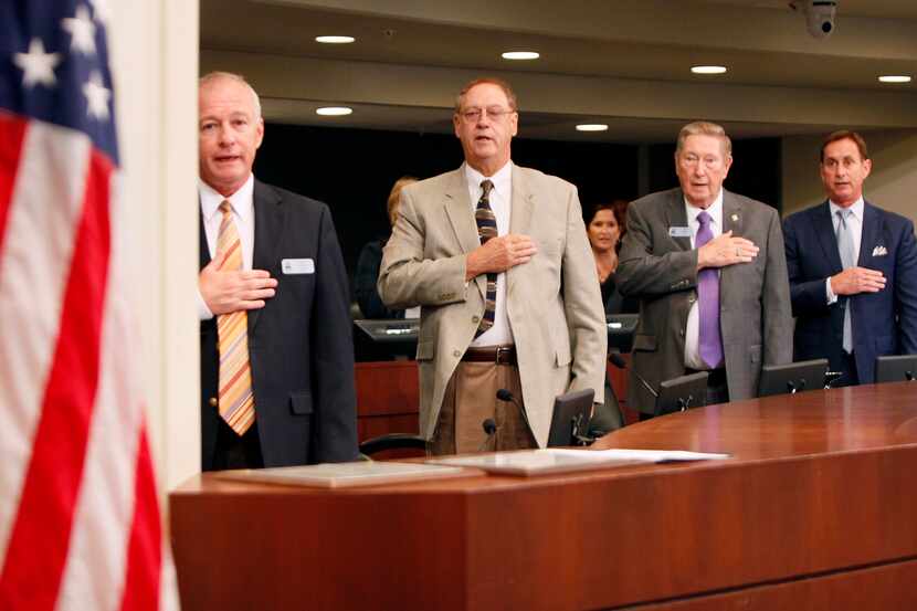 Farmers Branch Mayor Bob Phelps, third from left, stands with other council members during...