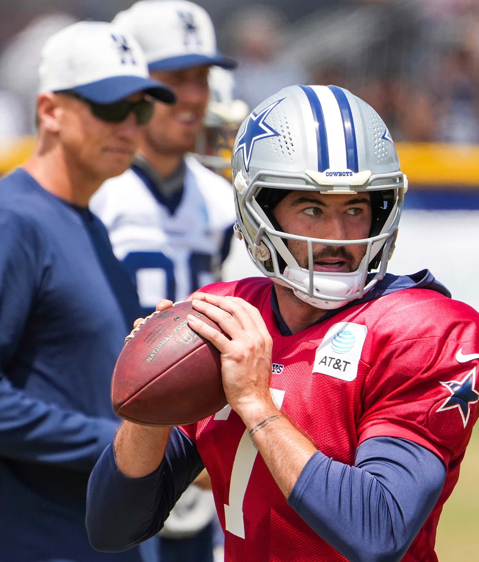 Dallas Cowboys quarterback Ben DiNucci (7) looks to pass during a practice at training camp...