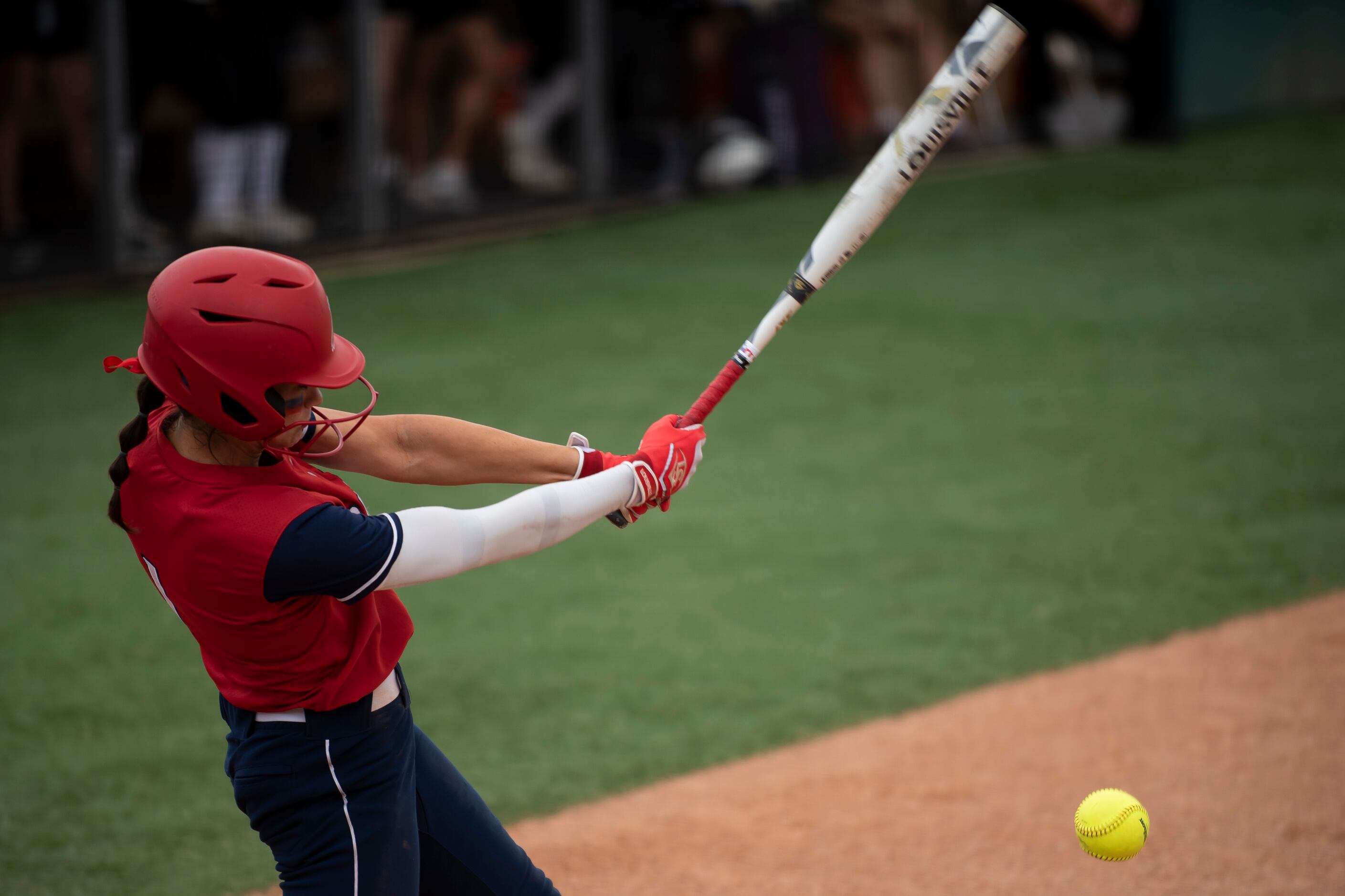John Paul II senior Emma Rodrigues (1) makes contact with a pitch during the TAPPS Softball...