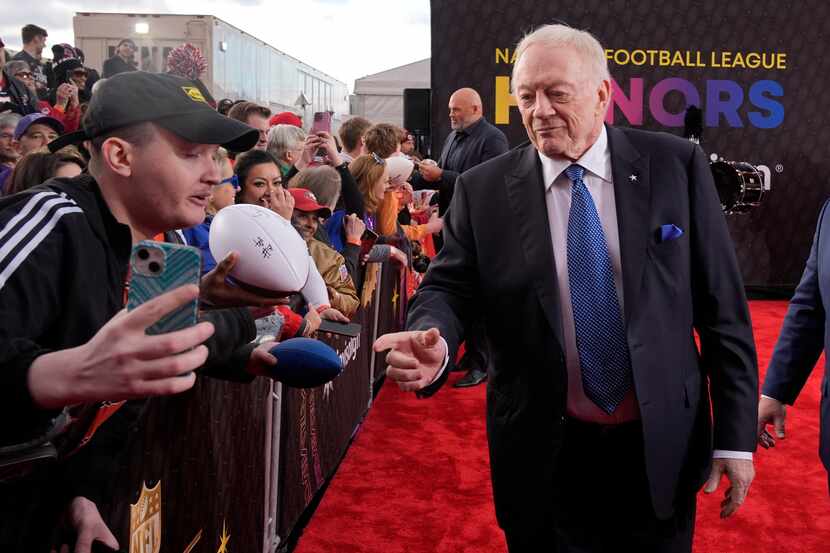 Dallas Cowboys owner Jerry Jones meets with fans on the red carpet at the NFL Honors award...