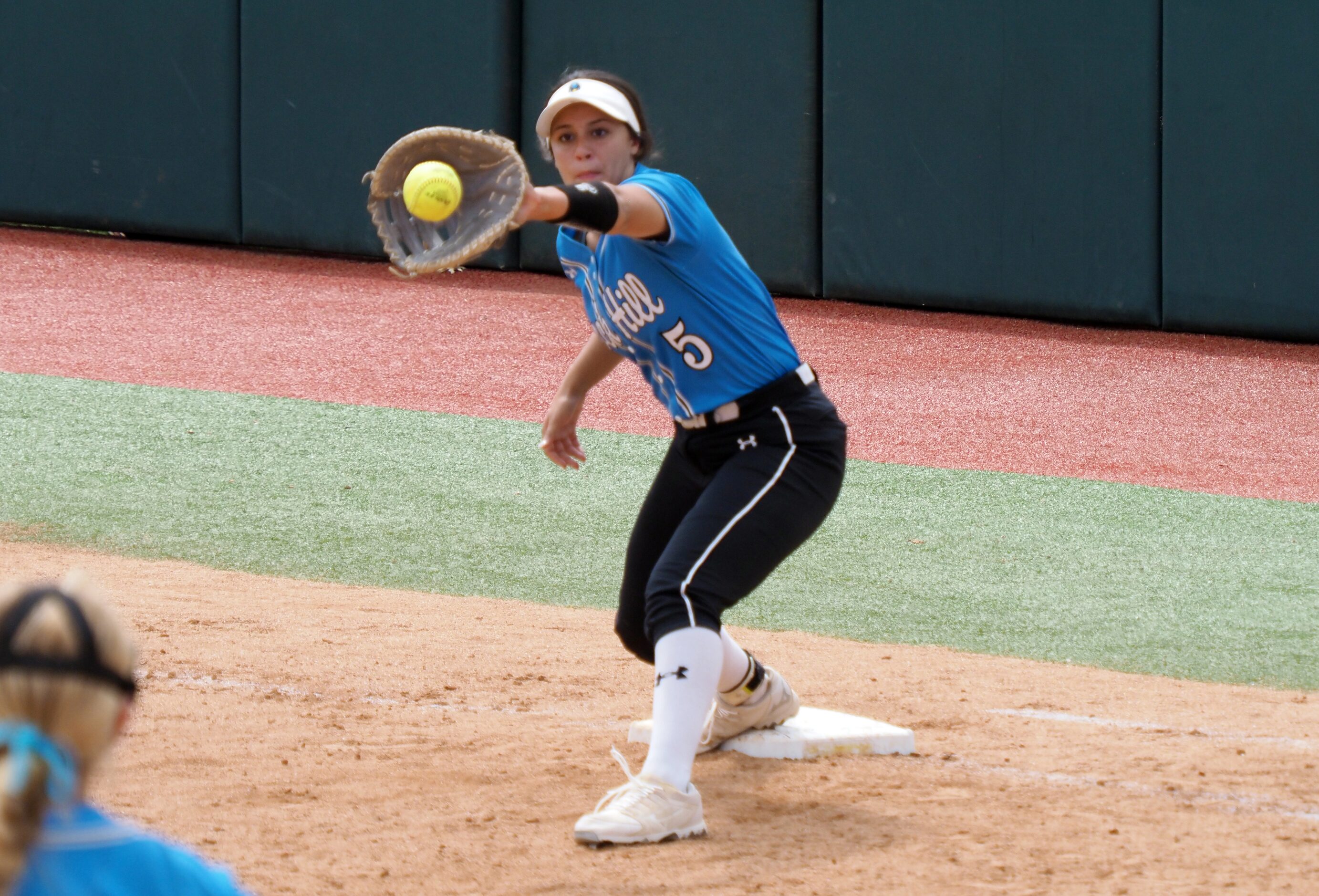 Prosper Rock Hill first baseman Katerina Luna makes an out at first against Montgomery Lake...