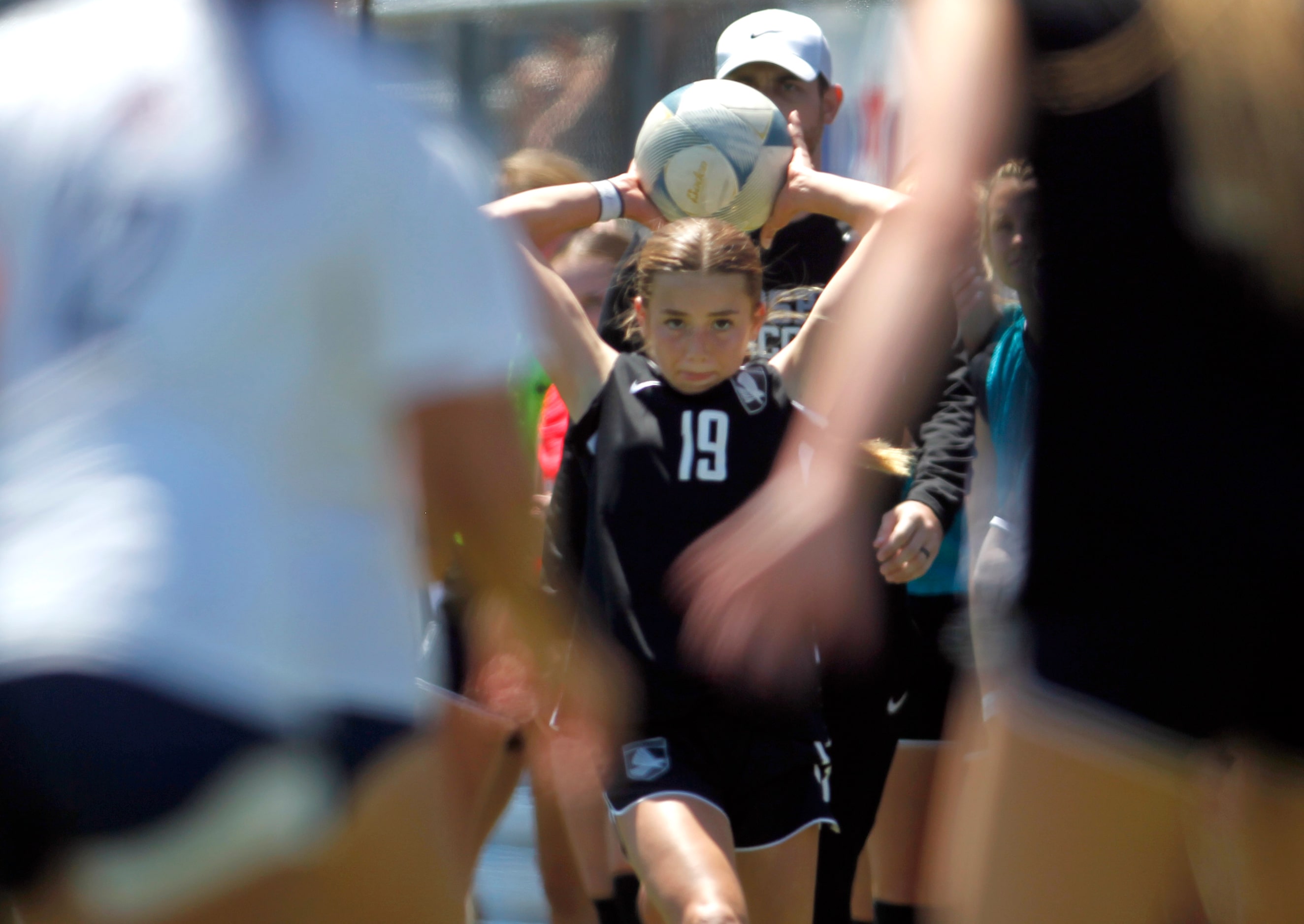  Prosper defenseman Charlie Tuzzolino (19) prepares to make a "throw-in" during first half...