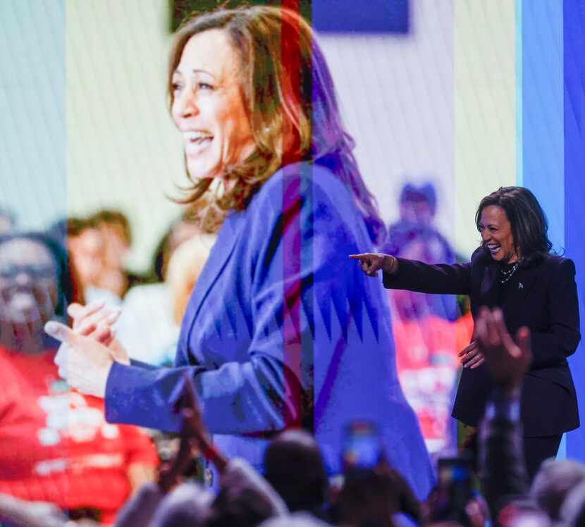 Vice President Kamala Harris points to the crowd while exiting the stage during American...