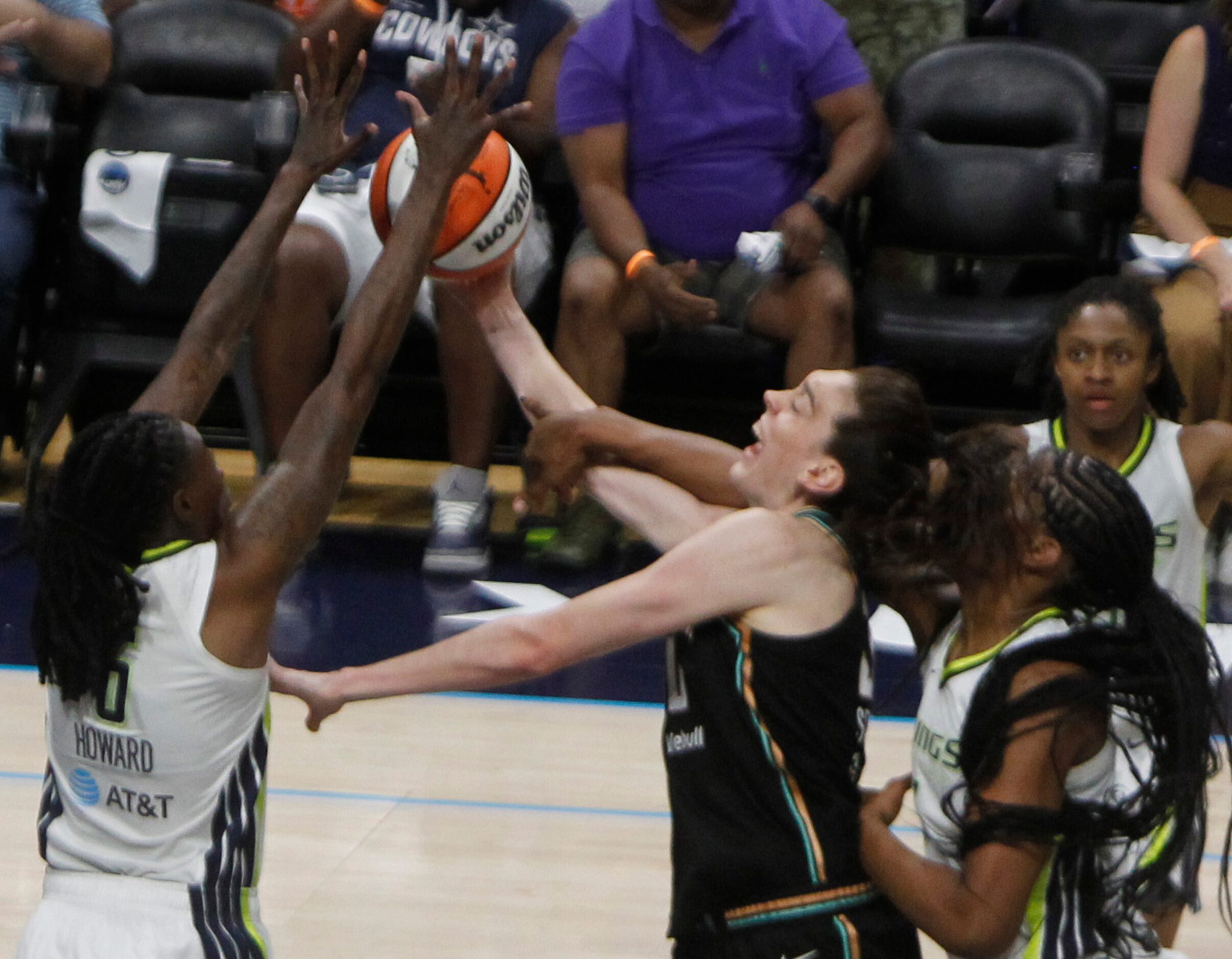 New York Liberty forward Breanne Stewart (3) is swarmed defensively by Dallas Wings forward...