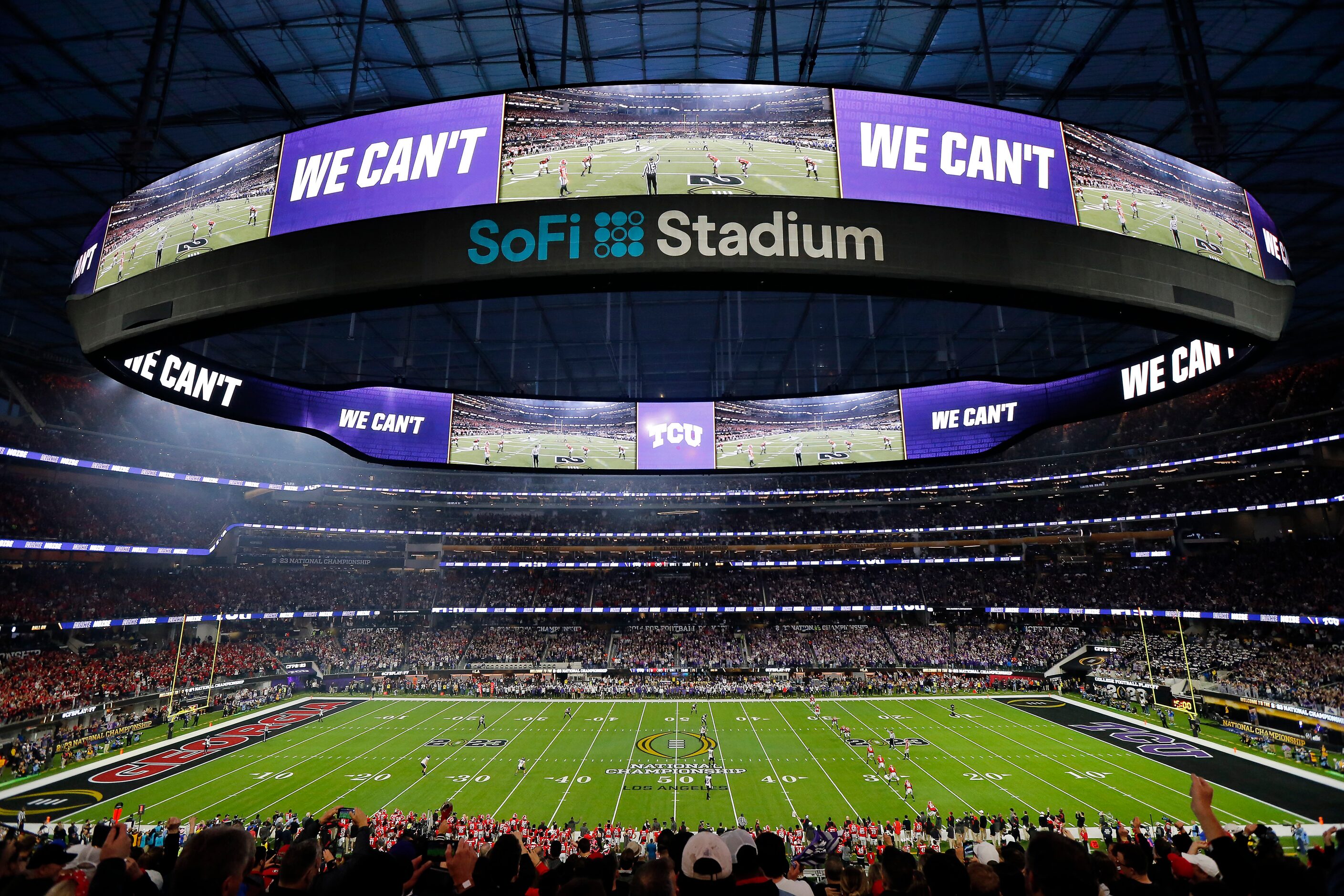 The Georgia Bulldogs prepare to kick off to the TCU Horned Frogs to begin the CFP National...