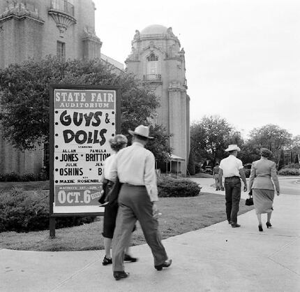 A vintage photo of State Fair Musicals in Fair Park, with a poster advertising Guys and...