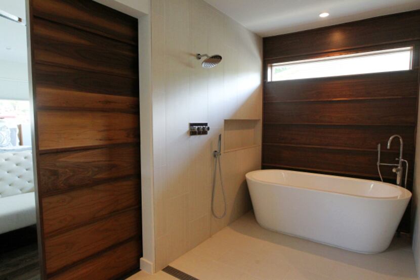 On Houzz.com Tauri found an image that combined shower and bathing areas into a single,...