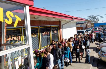 People lineup for Norma's annual roll back deals, including its anniversary special and...