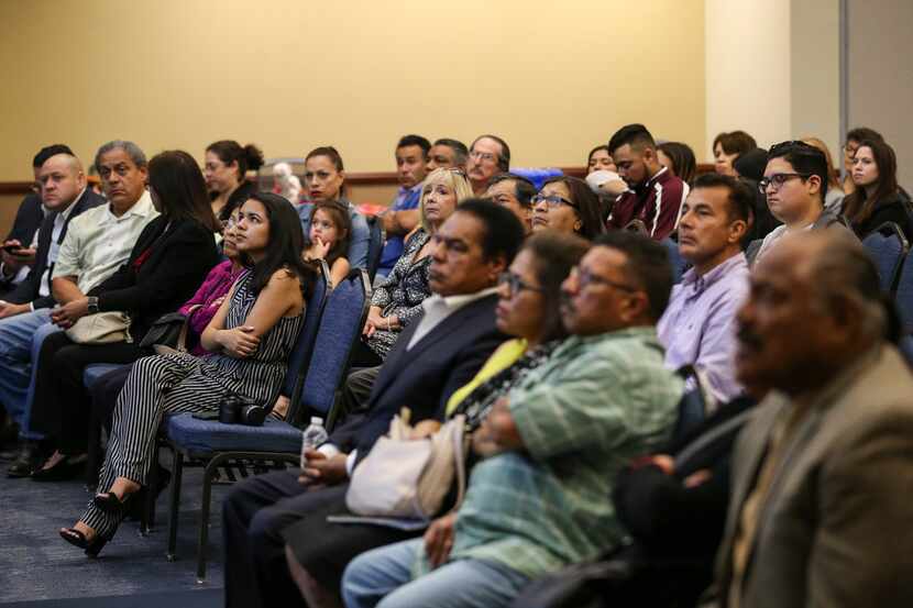 People listened Tuesday as state Sen. Royce West, D-Dallas speaks during a town hall meeting...