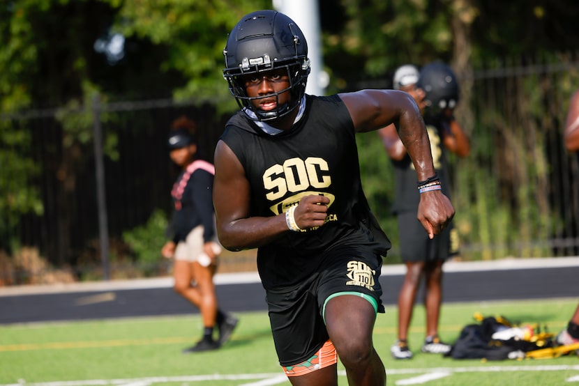 Linebacker Jayden Shelton runs a drill during South Oak Cliff’s first day of football...