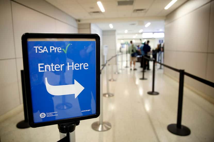 A TSA Pre-check lane in Terminal A of Dallas-Fort Worth International Airport. (2014 File...