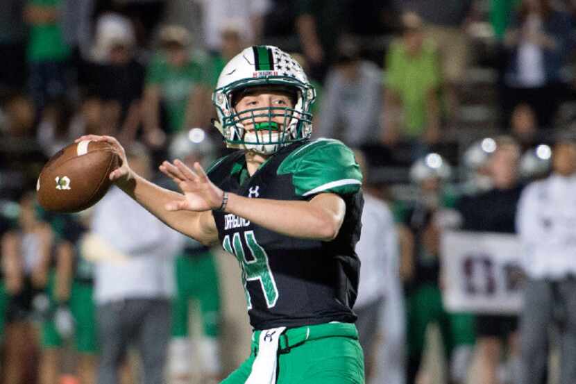 Southlake Carroll sophomore quarterback Will Bowers drops back to pass in the second half of...
