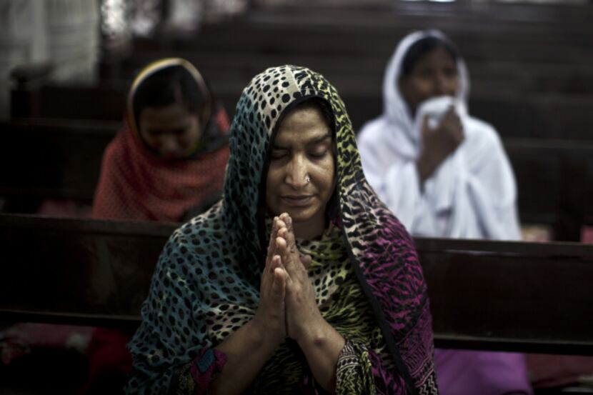 Pakistani Christian worshippers prayed Sept. 23 in a special mass for the victims of a...