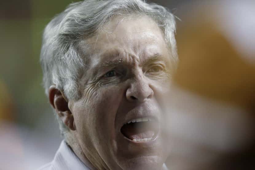 Mack Brown yells to his players during the Longhorns 31-21 win over Kansas State. (AP...