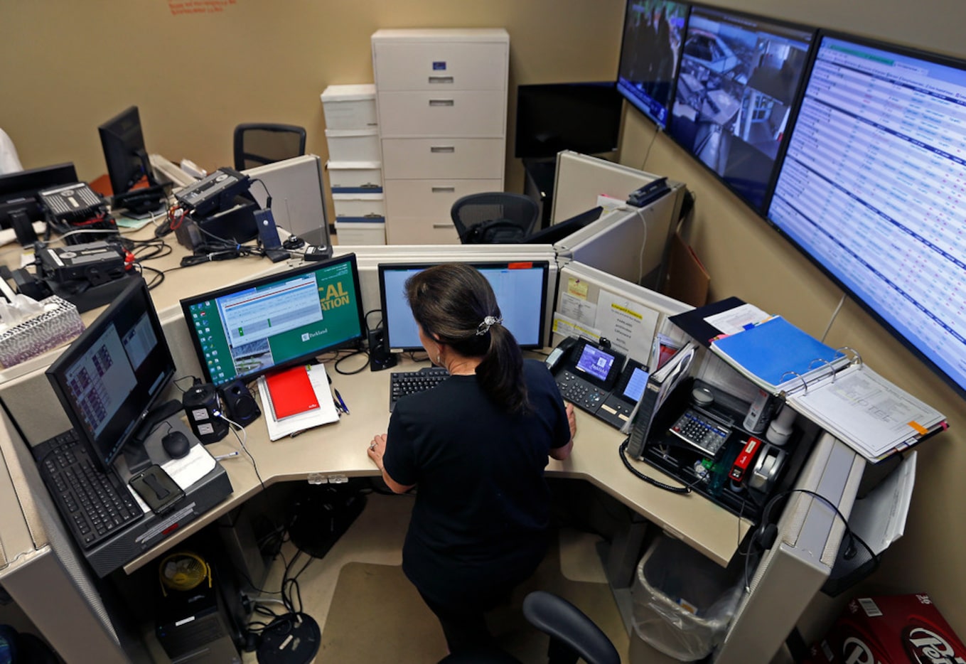 Registered nurse Catherine Knapp, a BioTel emergency medical service specialist, works at...