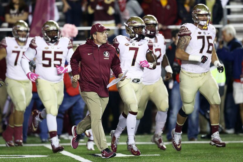 CHESTNUT HILL, MA - OCTOBER 27: Head coach Jimbo Fisher of the Florida State Seminoles leads...