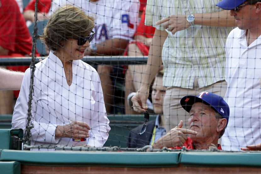 Former President George W. Bush and wife Laura attended Game 1 of the American League...