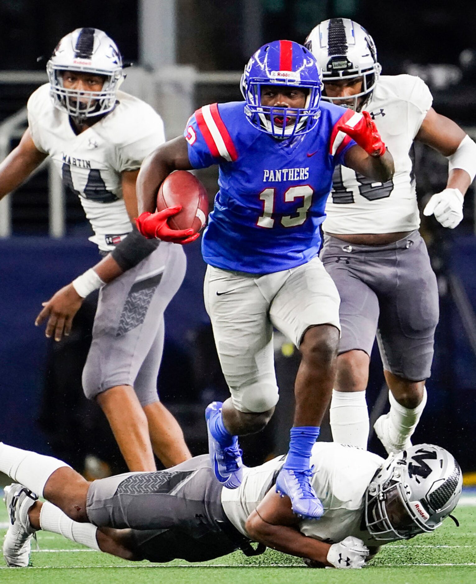 Duncanville wide receiver Roderick Daniels breaks away from the Arlington Martin defense on...