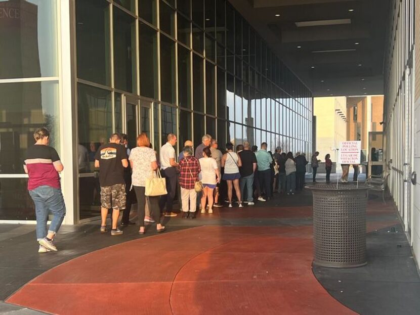 Voters line up outside the Collin College Frisco Campus about 5:30 p.m. on March 5, 2024.