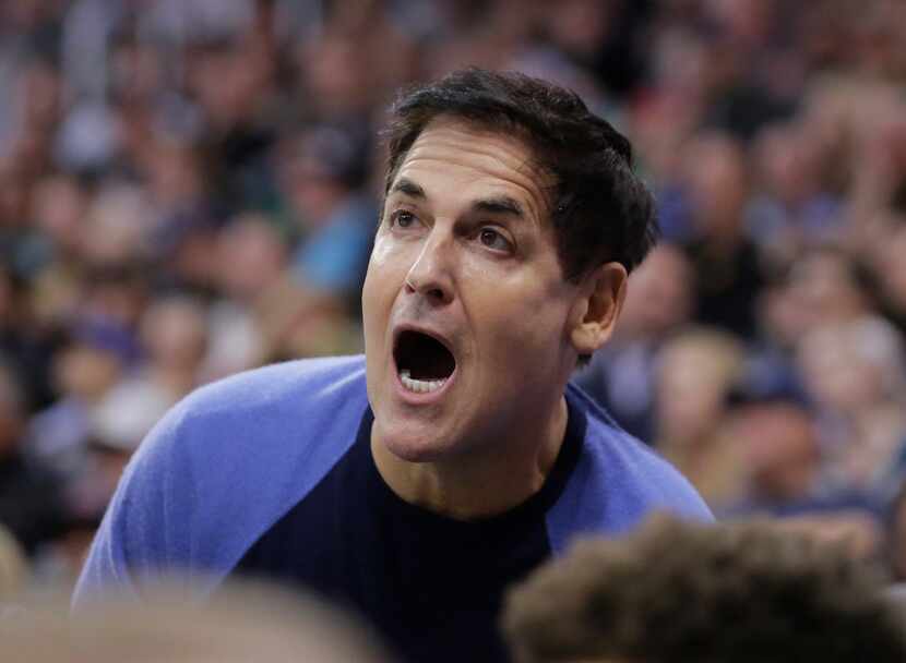 In this Dec. 16, 2016 file photo, Dallas Mavericks owner Mark Cuban shouts to his team in...