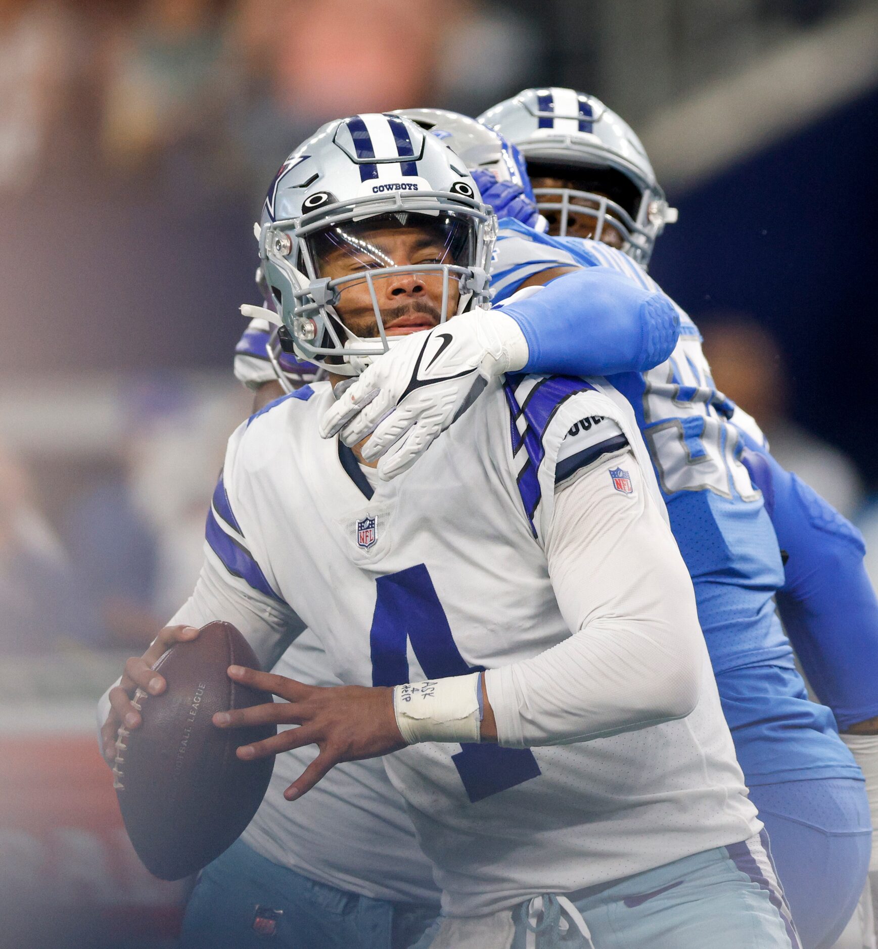 Detroit Lions linebacker Julian Okwara (99) sacks Dallas Cowboys quarterback Dak Prescott...