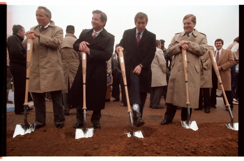 (Left to right) Edward Rose, Texas Rangers; Arlington Mayor Richard Greene; George W. Bush,...