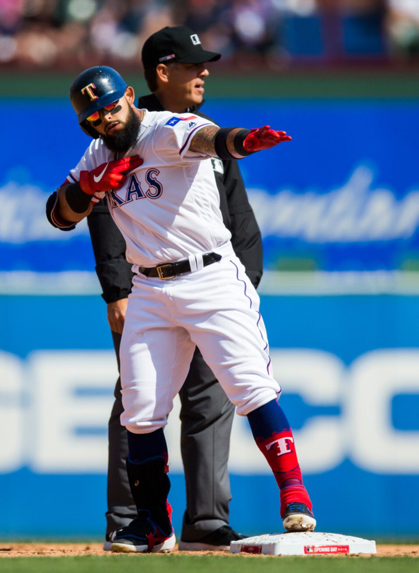 Texas Rangers second baseman Rougned Odor (12) celebrates after making it to second base...