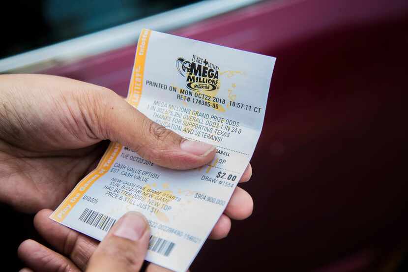 Lakeshiya Williams of Dallas bought her lottery tickets for Tuesday night's Mega Millions at...