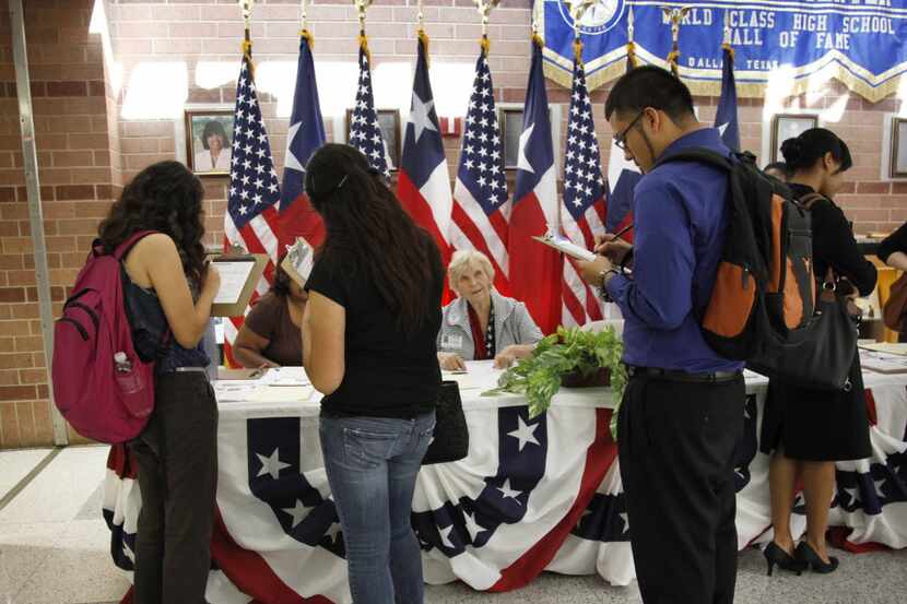 Students register to vote during National Voter Registration Day in 2012.