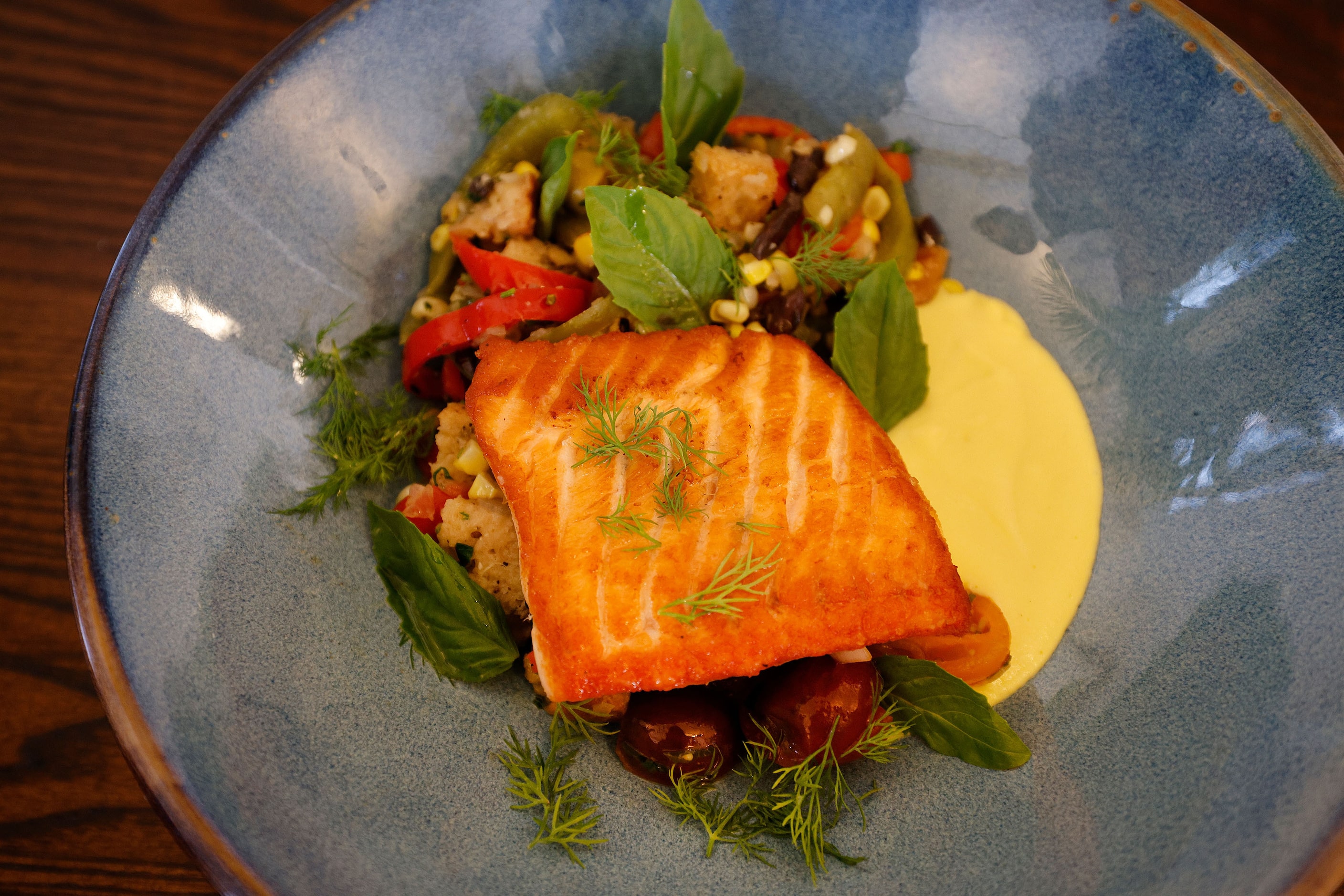 Broiled Salmon Filet is on the menu at Second Bar + Kitchen at The Crazy Water Hotel in...