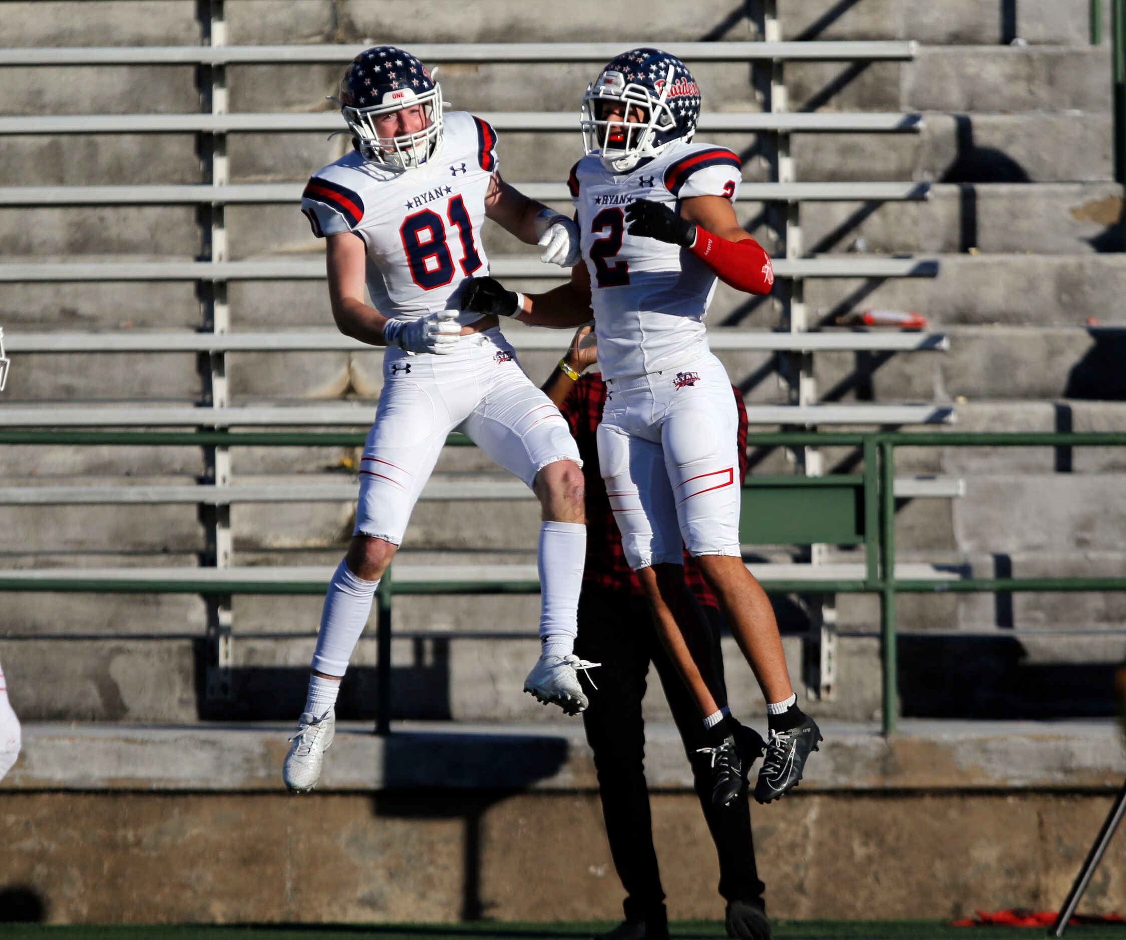 Denton Ryan’s Keagan Cunningham (81) and Billy Bowman Jr. (2) celebrate after Cunningham’s...