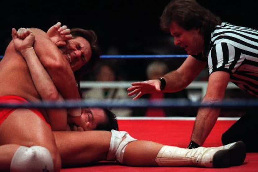 A wrestling match at the Dallas Sportatorium. 