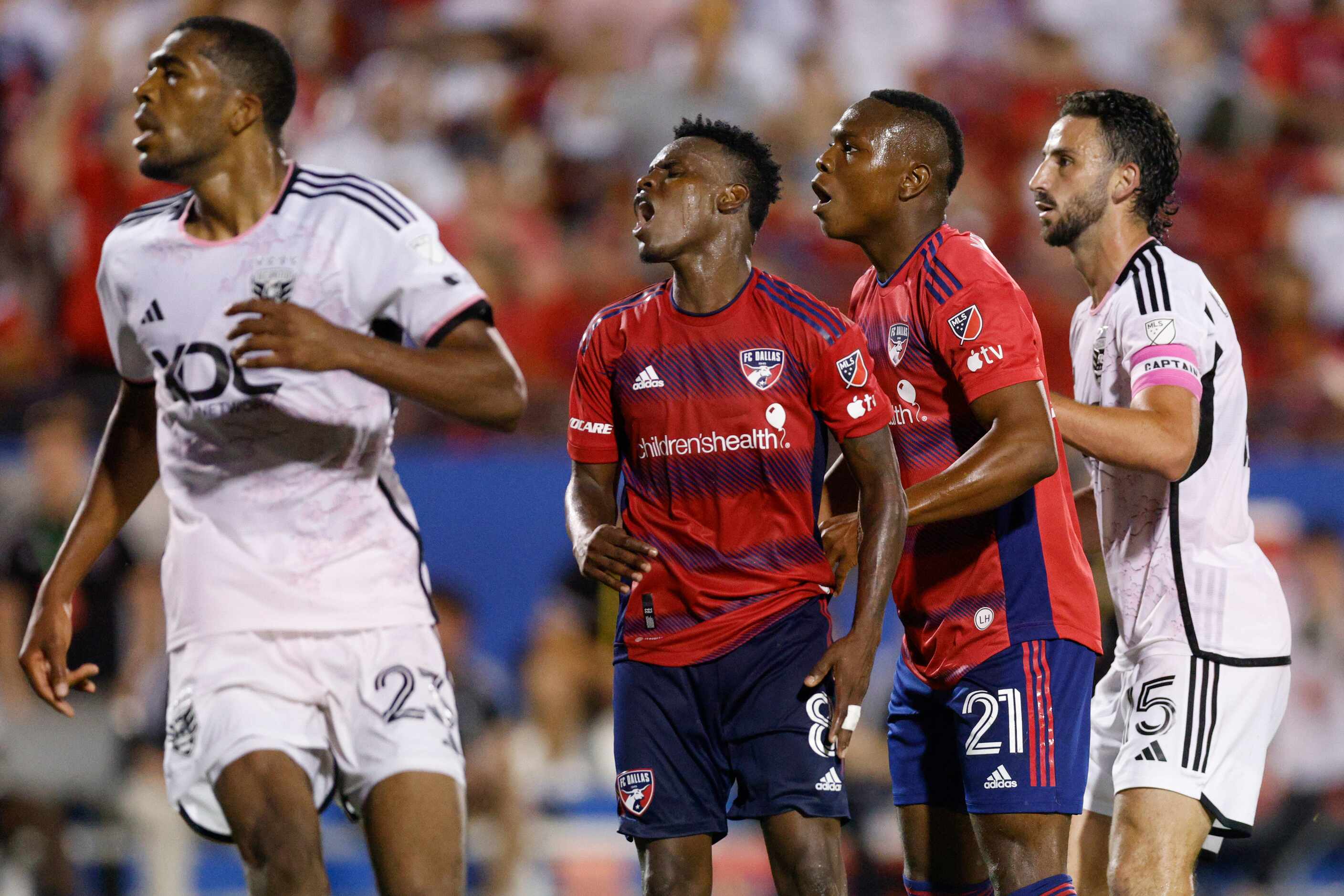 FC Dallas forwards Jáder Obrian (8) and José Mulato (21) react to a missed shot attempt...