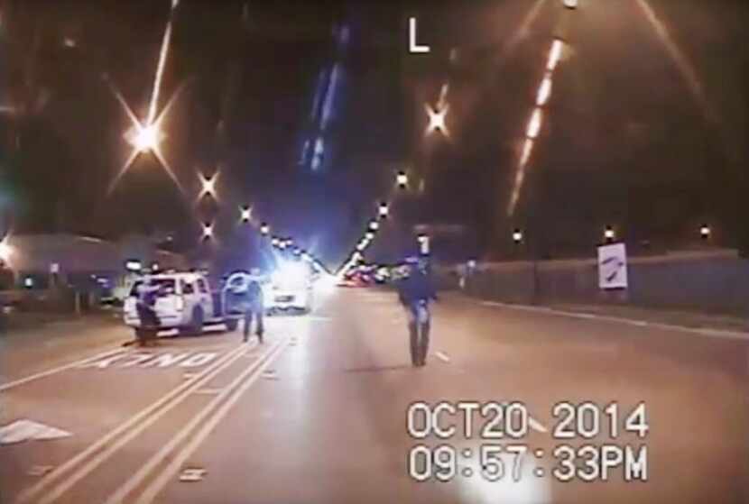 In this Oct. 20, 2014, frame from dash-cam video provided by the Chicago Police Department,...