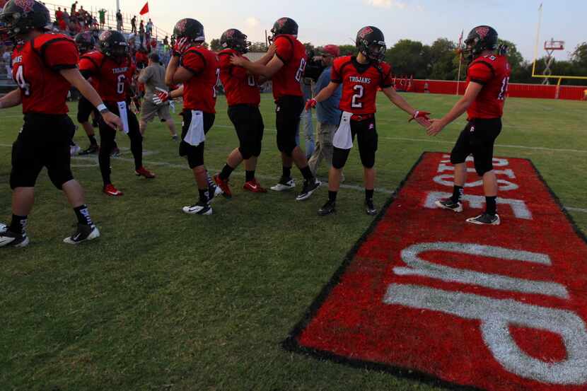The West High School Trojan's football team suited up for the opening season game Thursday...