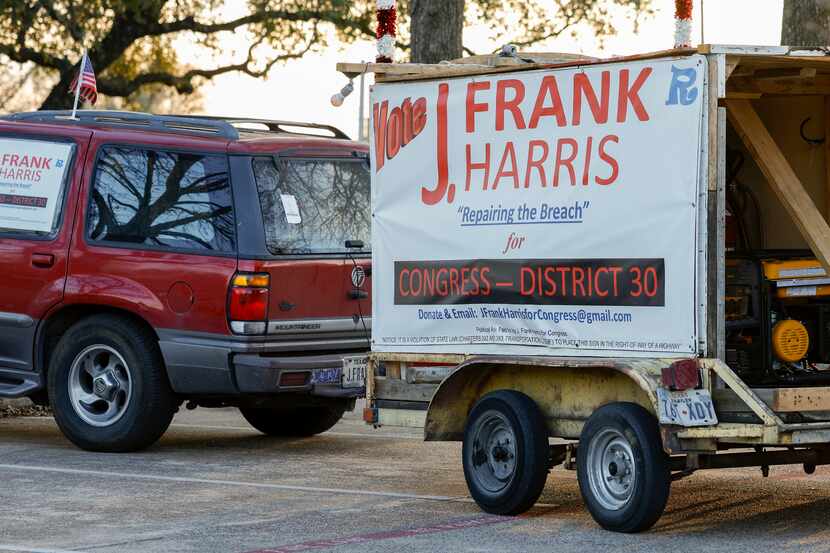 A car and trailer for congressional candidate James Frank Harris sit parked outside of...