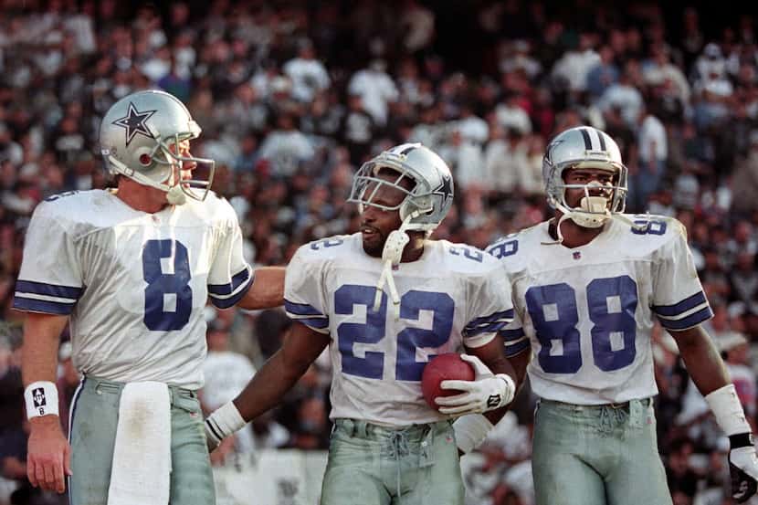 FILE - Dallas Cowboys (L-R) Troy Aikman, Emmitt Smith and Michael Irvin celebrate after...