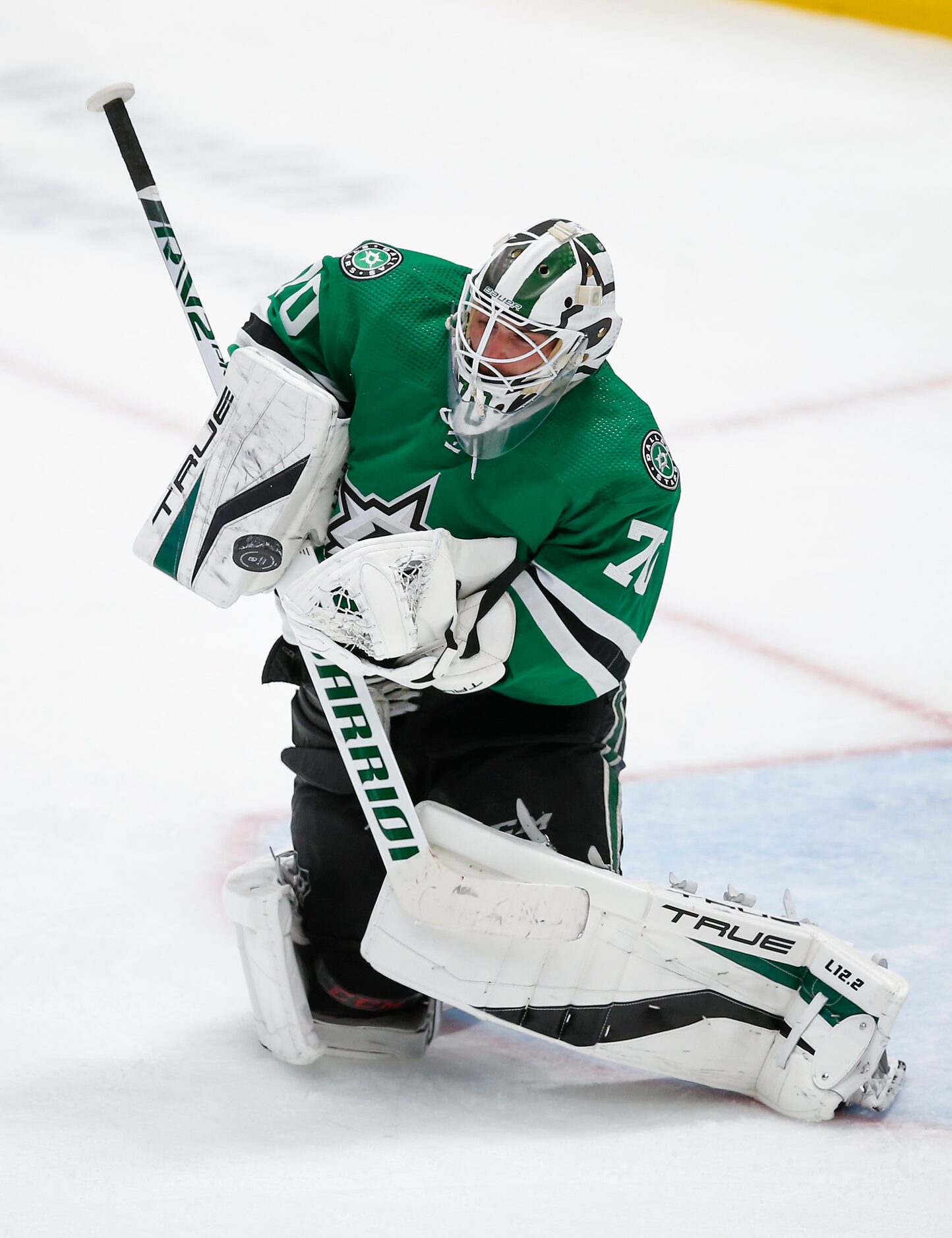 Dallas Stars goaltender Braden Holtby (70) stops a Carolina Hurricanes shot during the third...