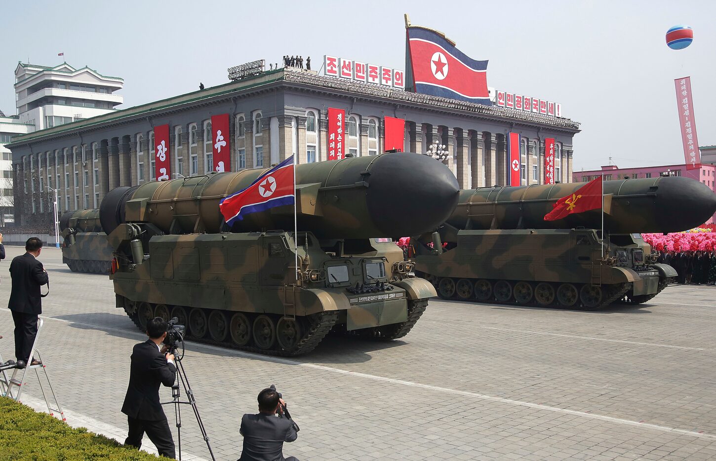 Missiles are paraded across Kim Il Sung Square during a military parade Saturday, April 15,...