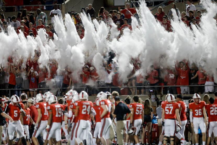 TXHSFB Coppell's student section uses baby powder to celebrate the start of the first half...