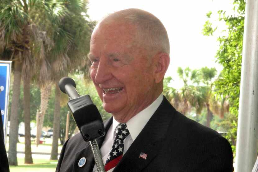 Billionaire businessman and former presidential candidate H. Ross Perot laughs during...