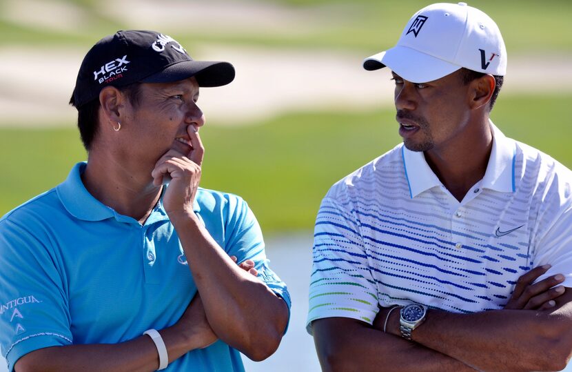 Notah Begay III, left, and Tiger Woods talk after wining the fifth annual Notah Begay III...