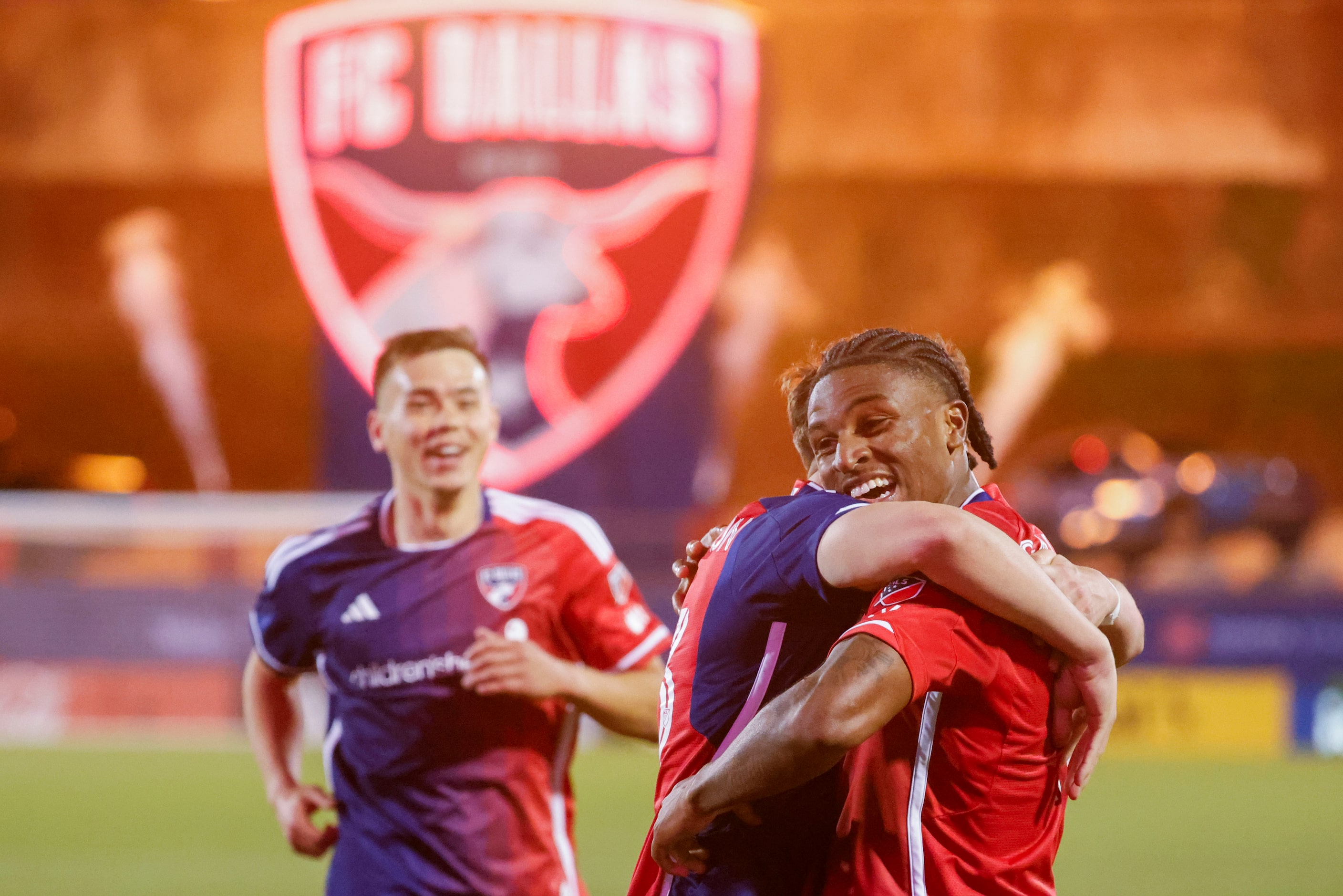 FC Dallas forward Dante Sealy (right) celebrates with this teammates after scoring a goal in...