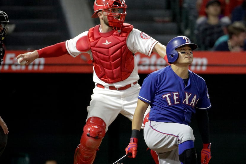 Texas Rangers' Shin-Soo Choo reacts after striking out against the Los Angeles Angels during...