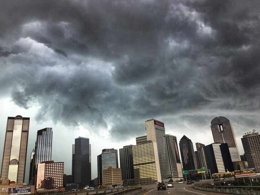 Ominous looking storm clouds roll over downtown Dallas, Monday afternoon, October 8....