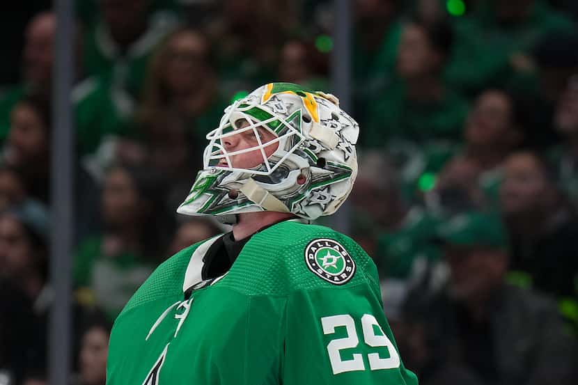 Dallas Stars goaltender Jake Oettinger (29) looks up at the scoreboard during the second...