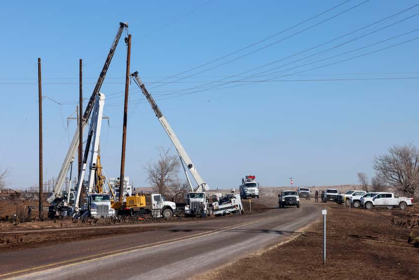 Crews worked to raise utility poles and reconnect power lines after the Smokehouse Creek...